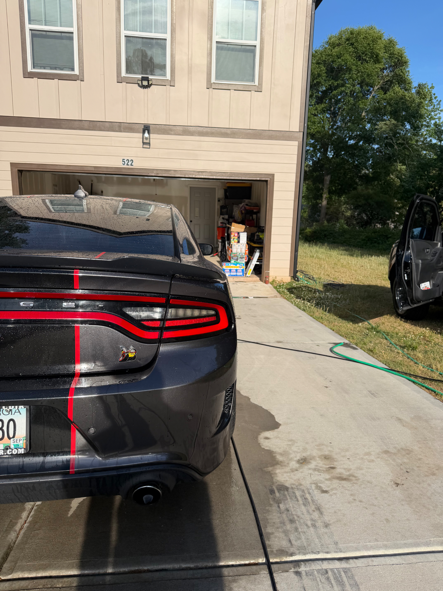 Freshly washed Charger glistening in the driveway